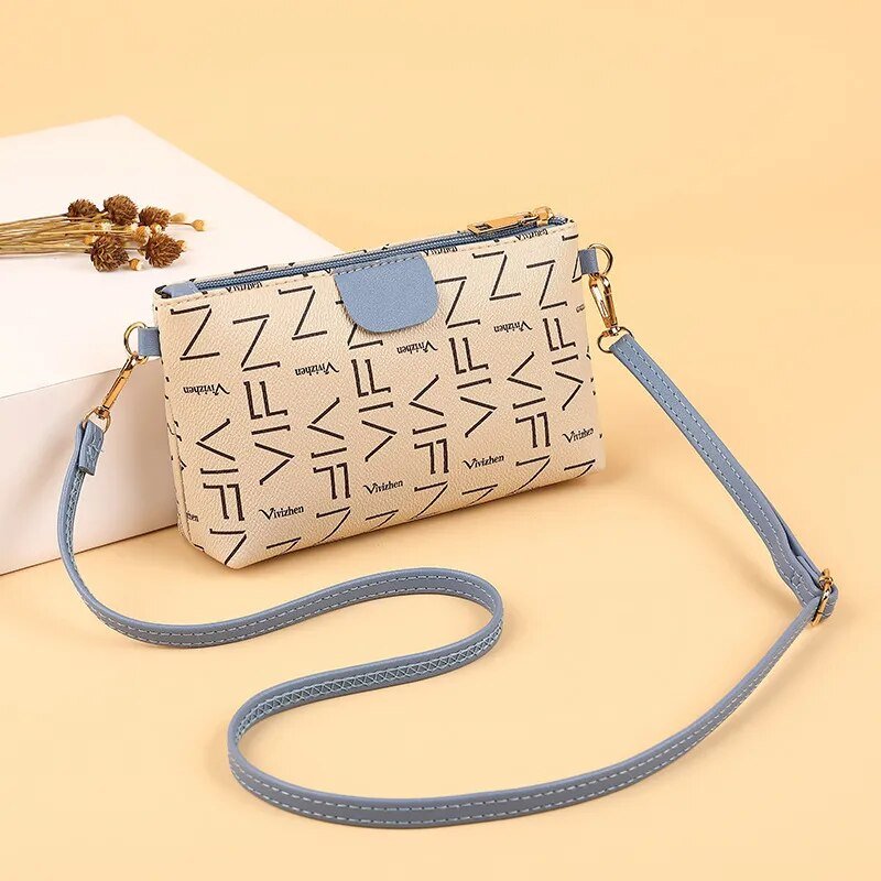 Bolso cruzado patrón letras Blanco y azul