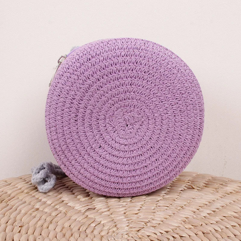 Bolso redondo de ratán Morado