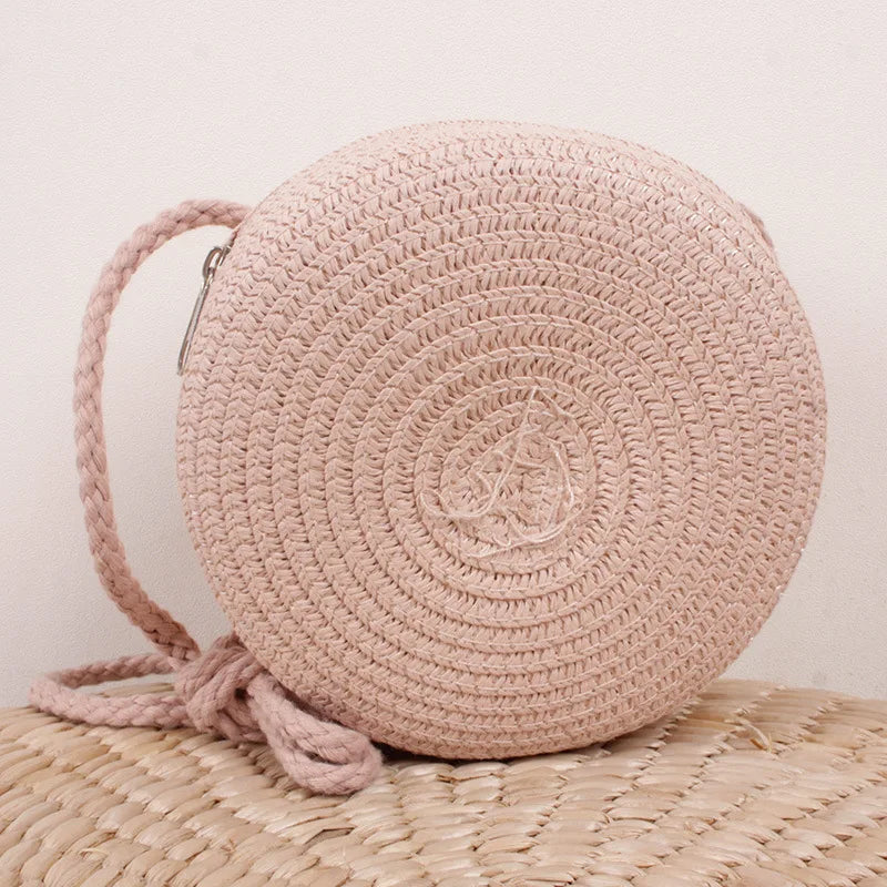 Bolso redondo de ratán Rosa